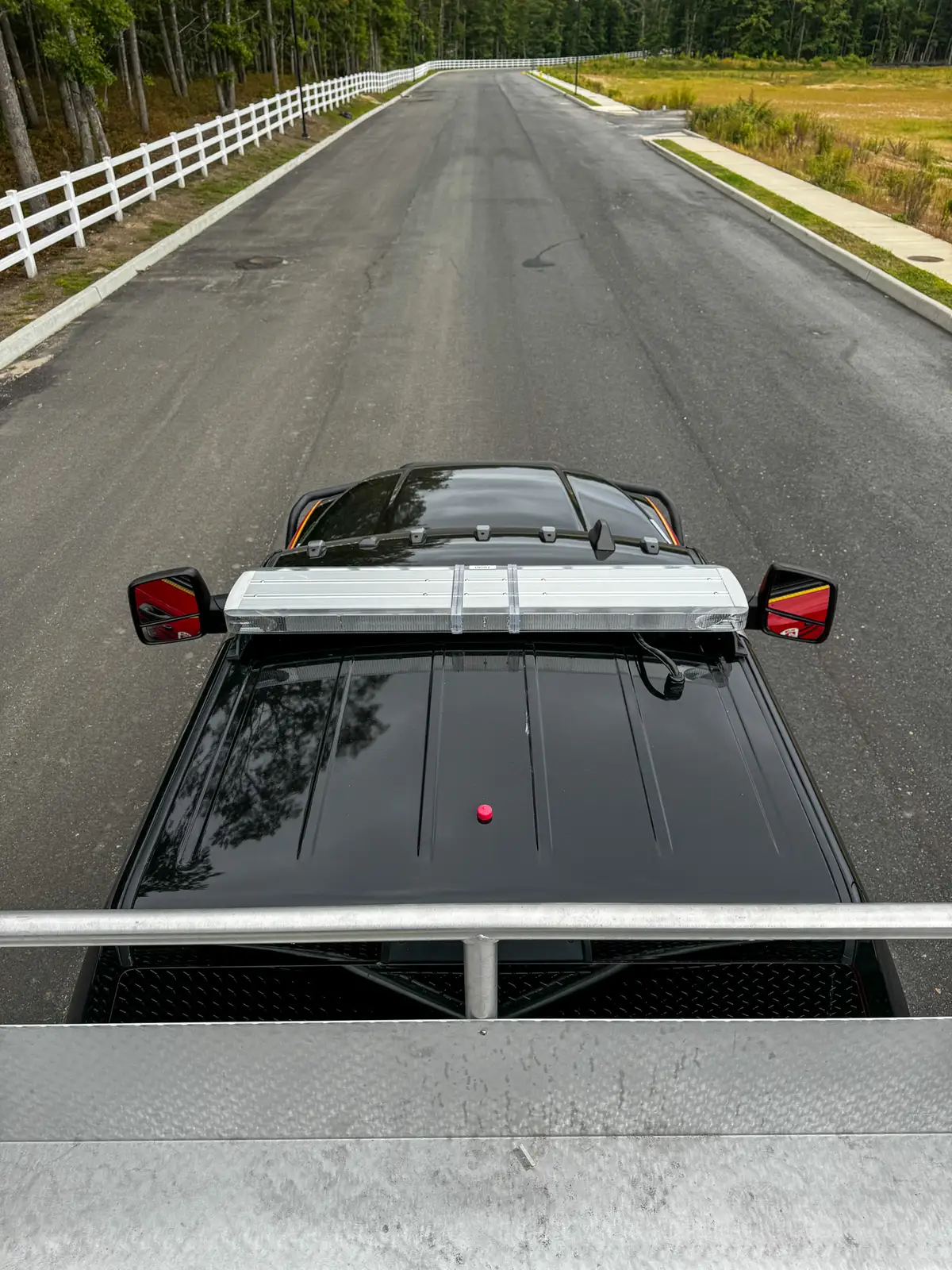 Front-left three-quarter exterior view with side body and rear bay visible.